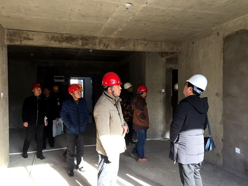 天工公司土建四部神木新村神南華府27、28#樓順利通過竣工驗收